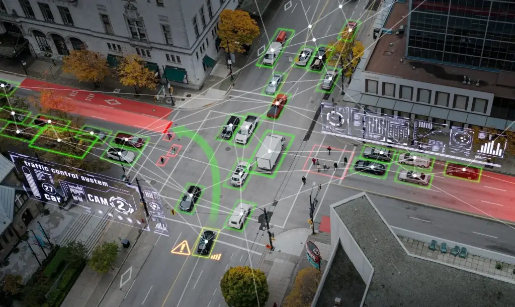 Aerial view of an urban intersection with simulated vehicle trajectories for autonomous driving testing Aerial view of an urban intersection with simulated vehicle trajectories for autonomous driving testing